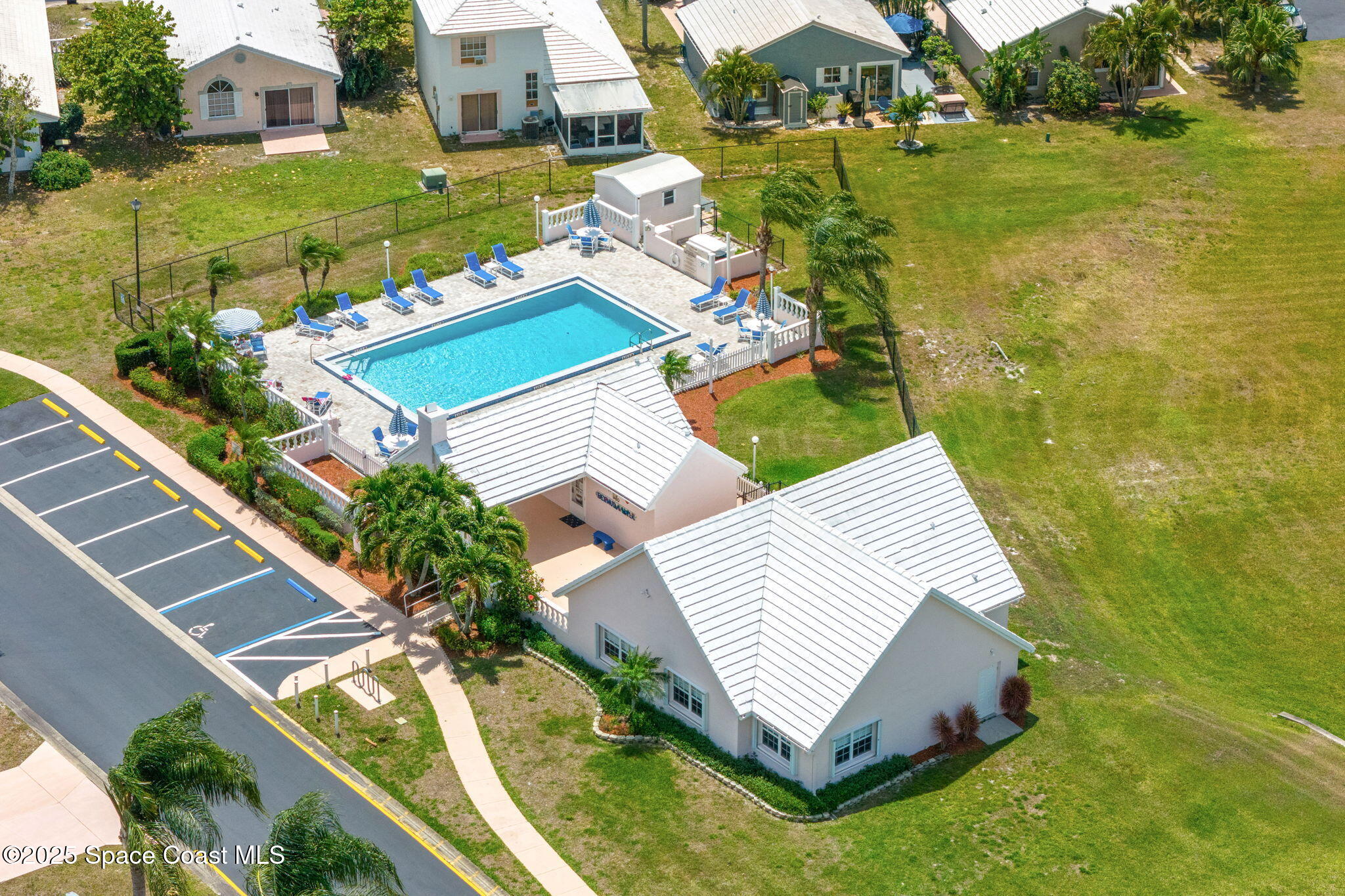 1157 Goldenrod Circle Northeast Palm Bay, FL 32905 - Photo 29 of 31 an aerial view of a house with outdoor space pool seating area and yard