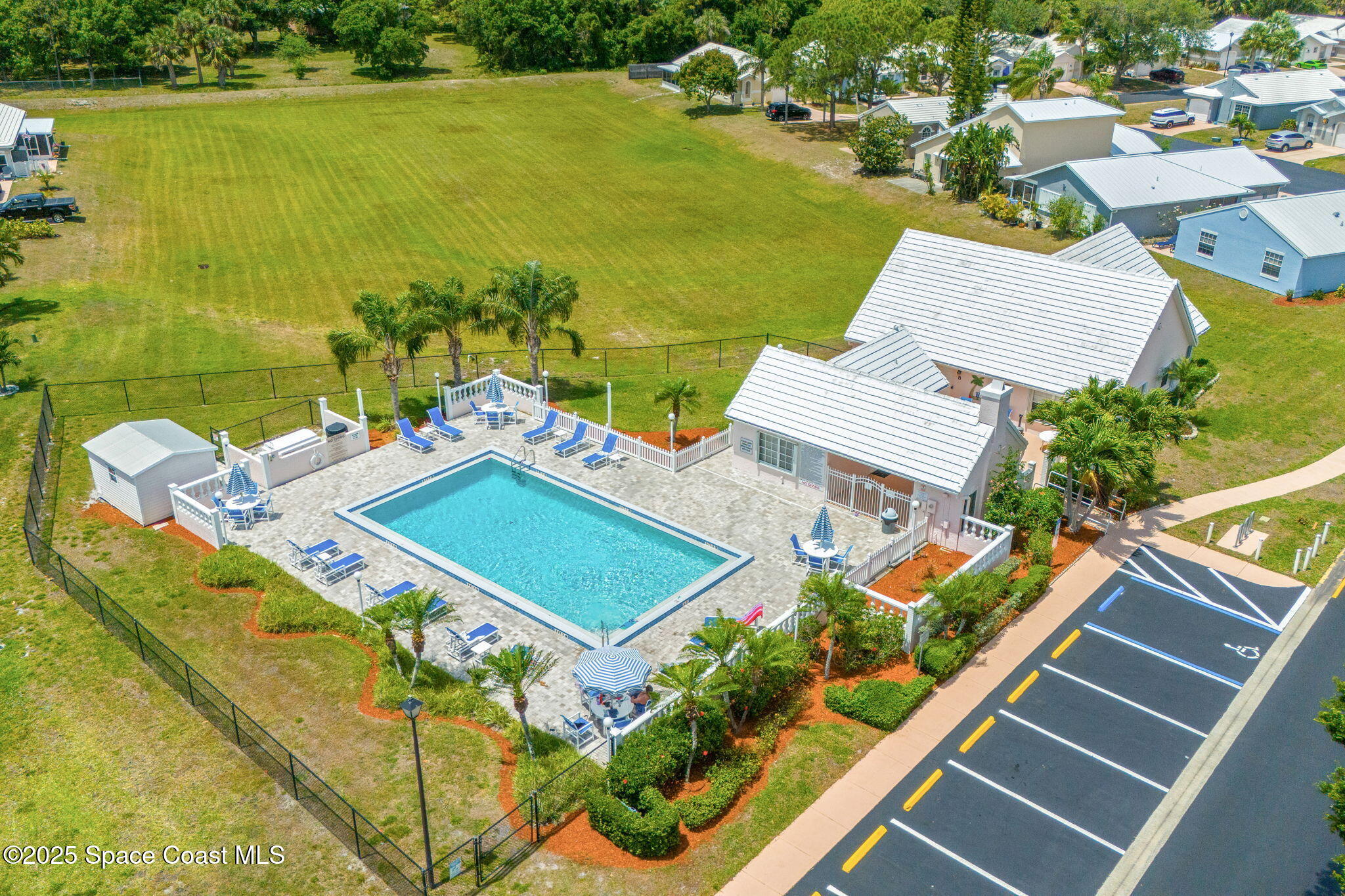 1157 Goldenrod Circle Northeast Palm Bay, FL 32905 - Photo 30 of 31 a view of a city with an ocean view