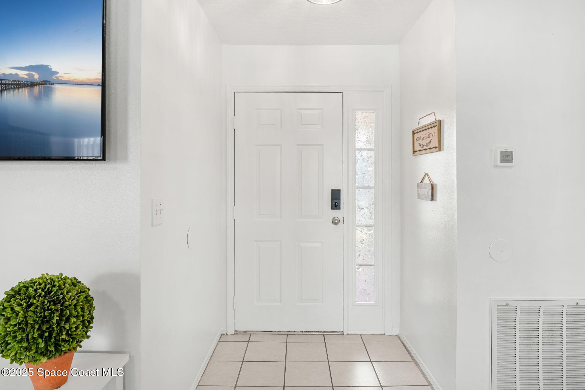 1157 Goldenrod Circle Northeast Palm Bay, FL 32905 - Photo 4 of 31 a view of an empty room