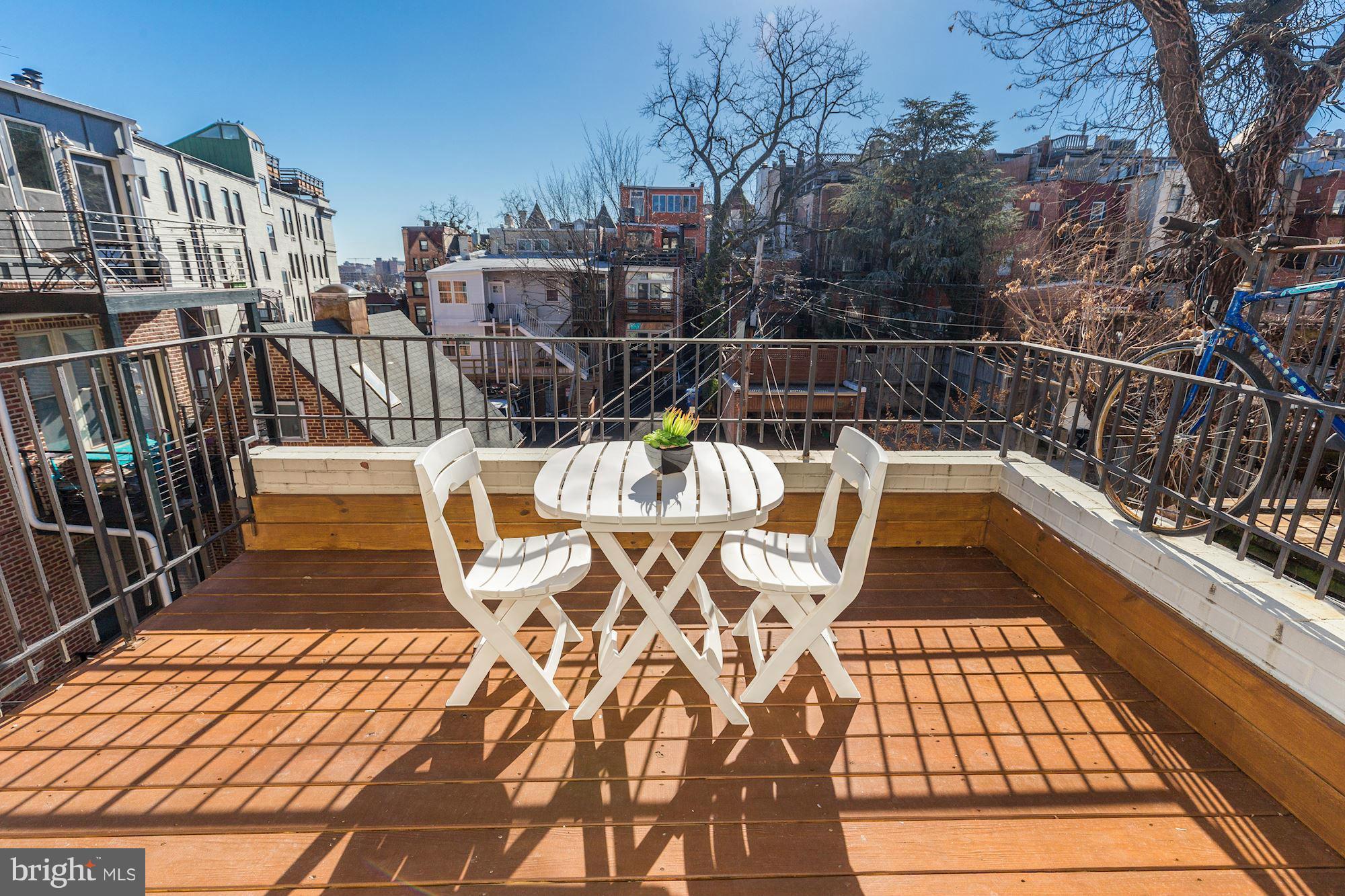 1806 Belmont Road Northwest, Unit 3 Washington, DC 20009 - Photo 16 of 21 a view of balcony with wooden floor