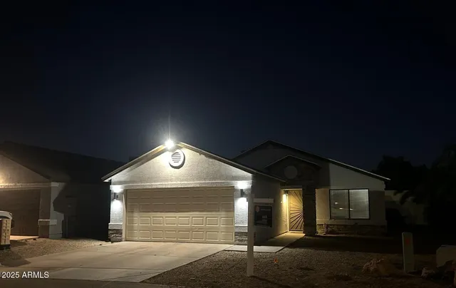 a view of garage with stairs