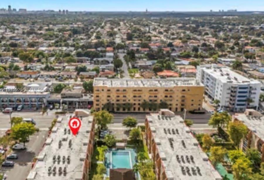 4841 Northwest 7th Street, Unit 2034 Miami, FL 33126 - Photo 2 of 8 an aerial view of city