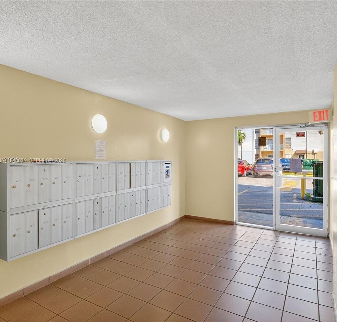 4841 Northwest 7th Street, Unit 2034 Miami, FL 33126 - Photo 4 of 8 a view of an empty room