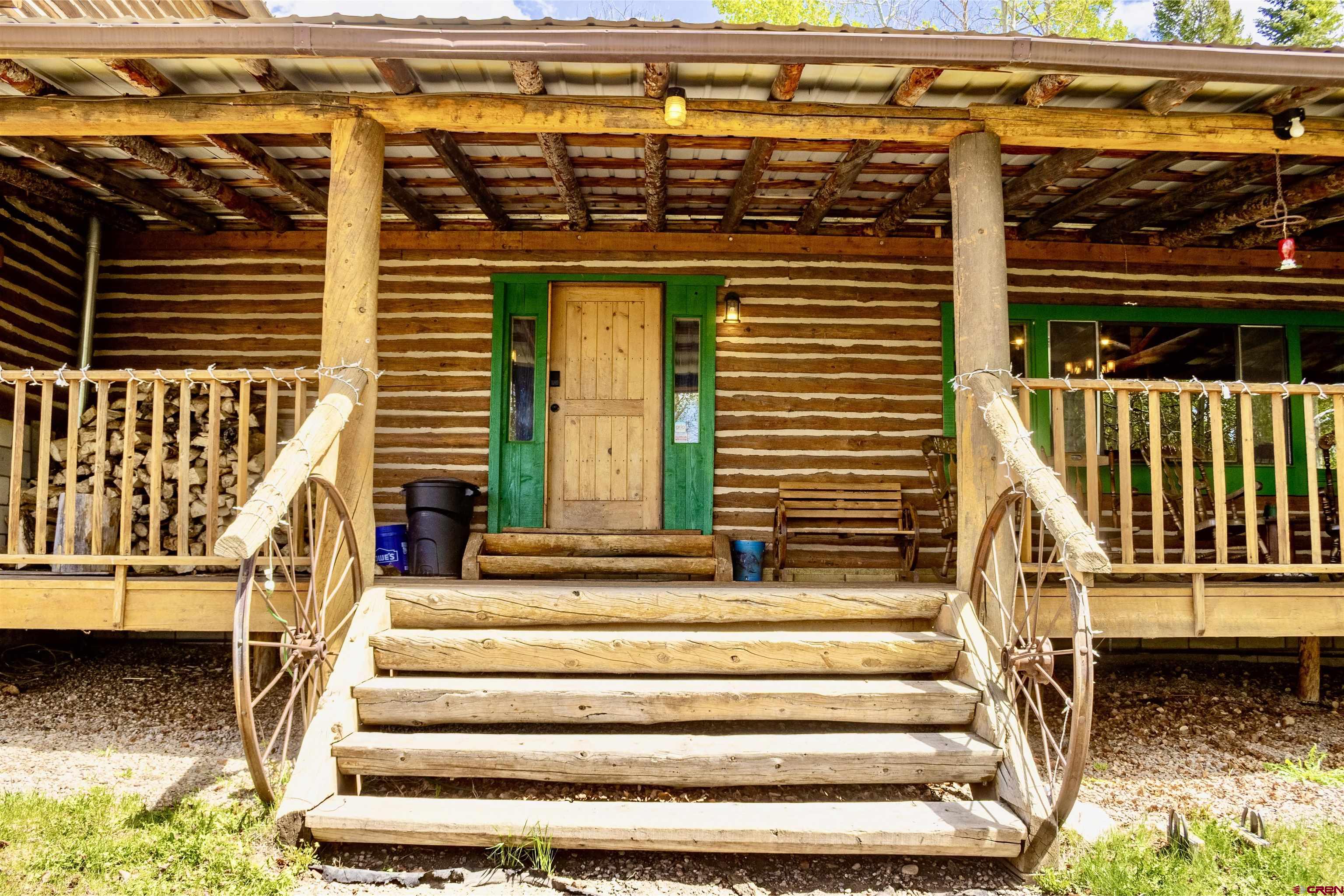 16 Arellano Road, Unit TRES CUERDAS LODGE Amalia, NM 87512 - Photo 12 of 45 a view of entryway with a front door