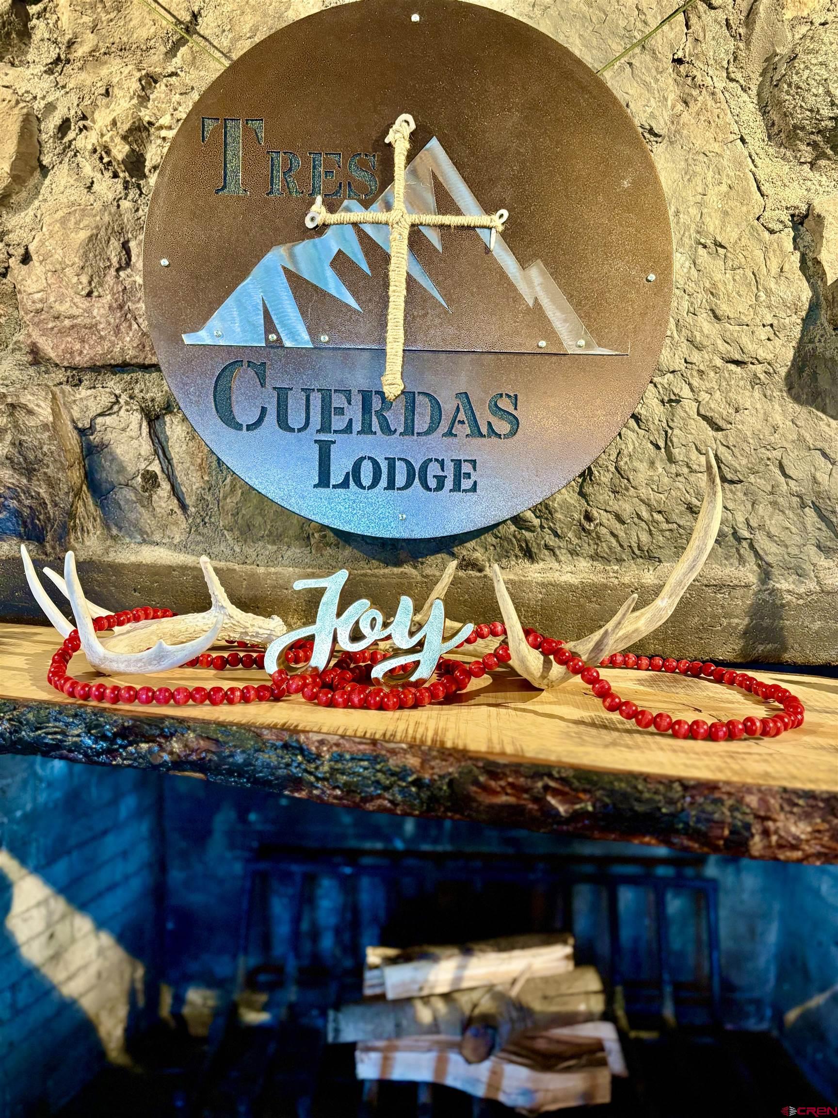 16 Arellano Road, Unit TRES CUERDAS LODGE Amalia, NM 87512 - Photo 17 of 45 a view of entryway with an outdoor space