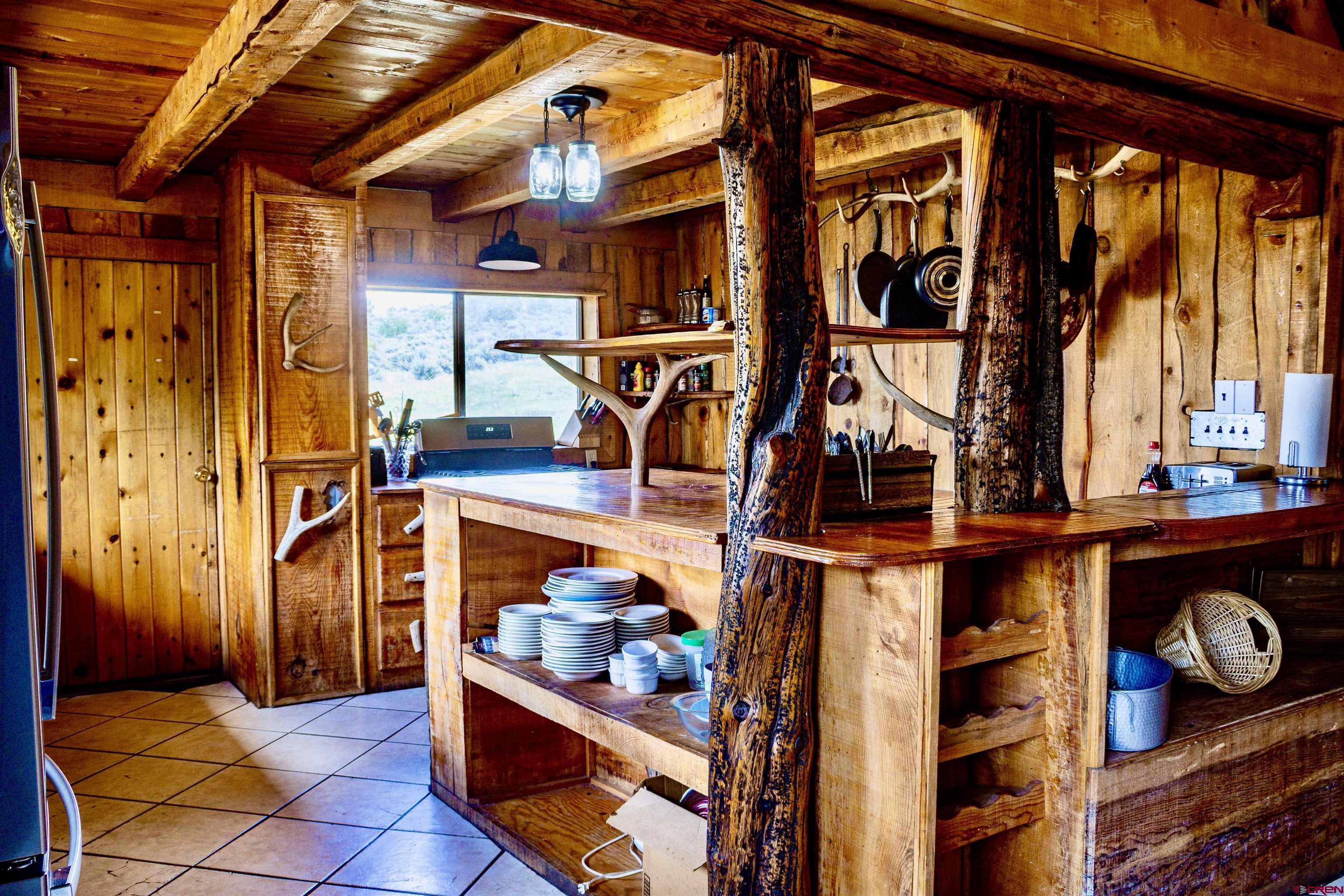 16 Arellano Road, Unit TRES CUERDAS LODGE Amalia, NM 87512 - Photo 20 of 45 a view of outdoor seating