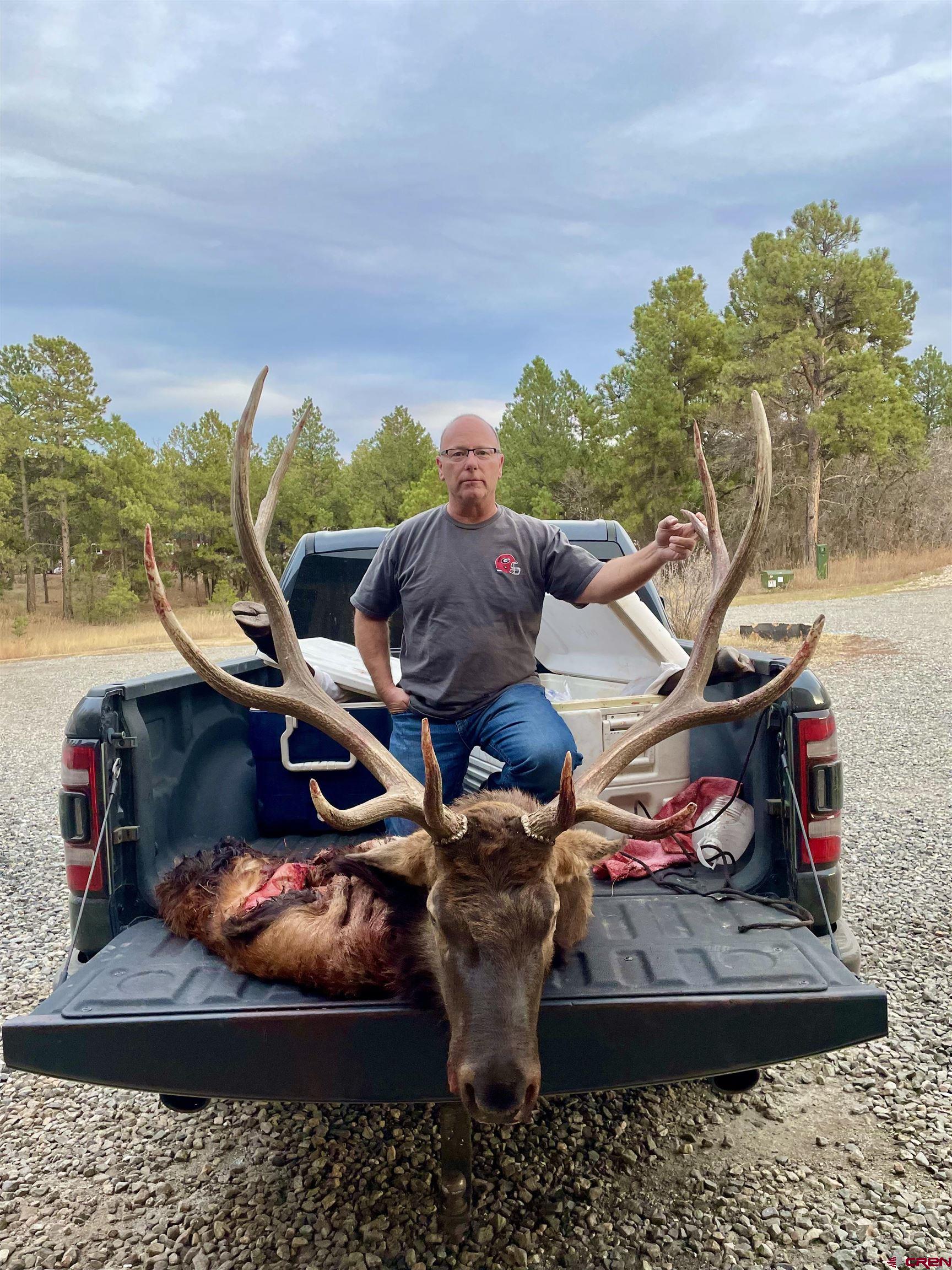 16 Arellano Road, Unit TRES CUERDAS LODGE Amalia, NM 87512 - Photo 2 of 45 a view of outdoor space and seating area