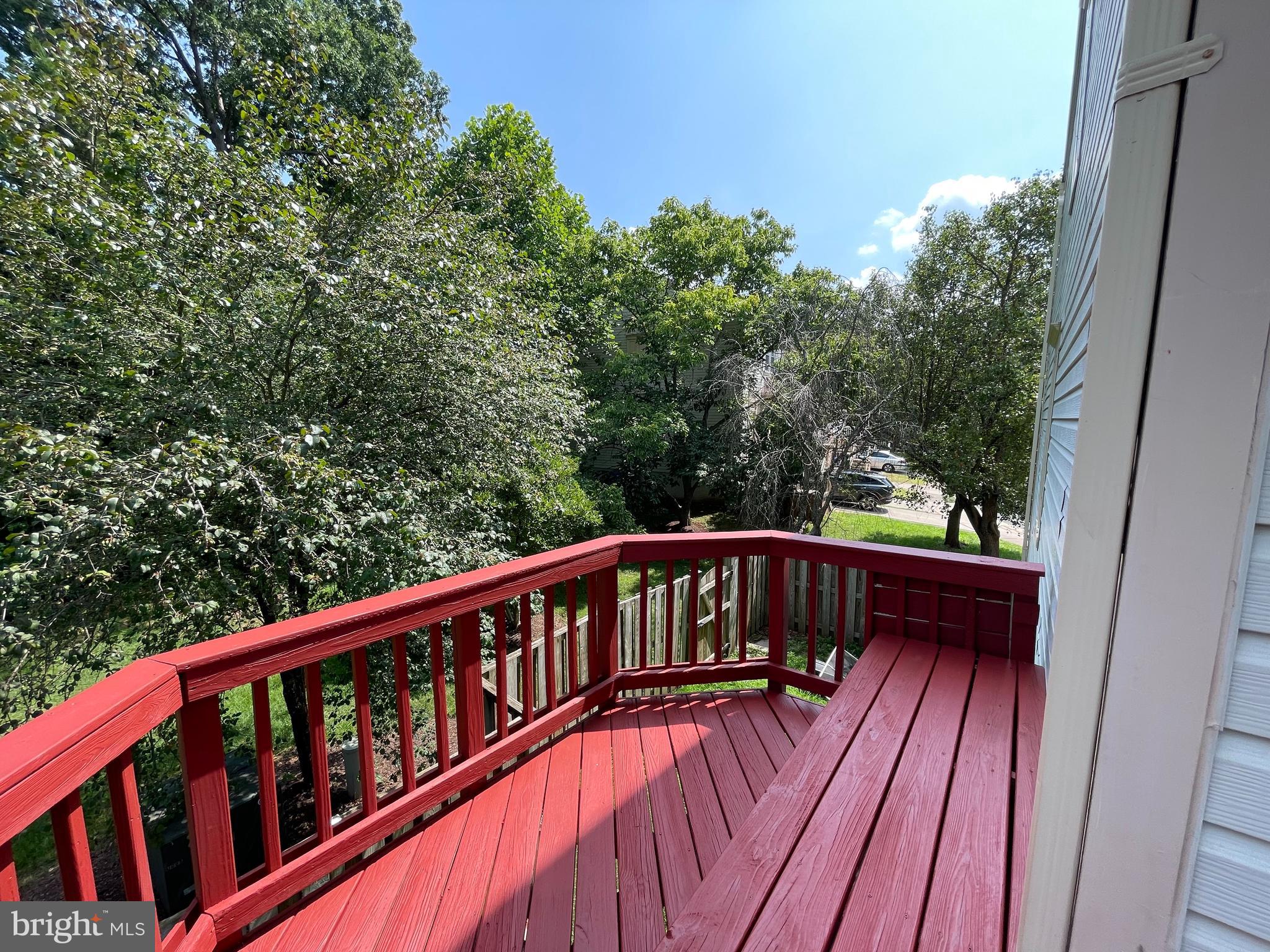 21924 Greentree Terrace Sterling, VA 20164 - Photo 12 of 29 a view of balcony with wooden floor