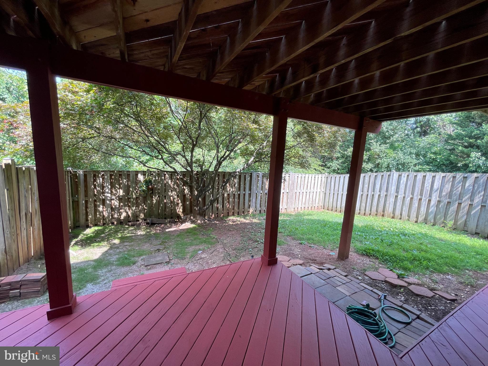 21924 Greentree Terrace Sterling, VA 20164 - Photo 16 of 29 a view of porch with wooden floor