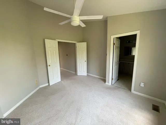 an empty room with a bathroom