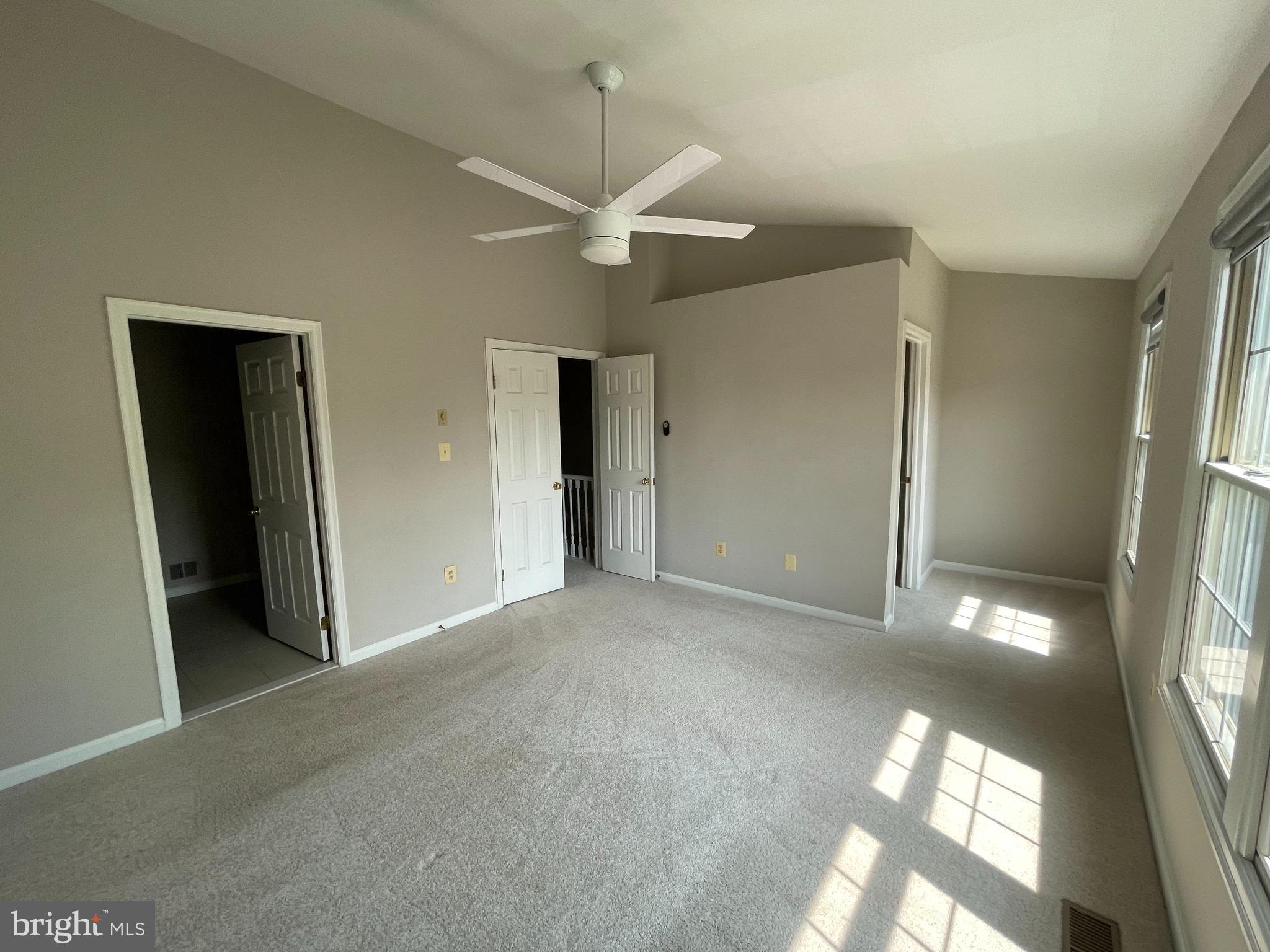 21924 Greentree Terrace Sterling, VA 20164 - Photo 27 of 29 an empty room with windows and entrance