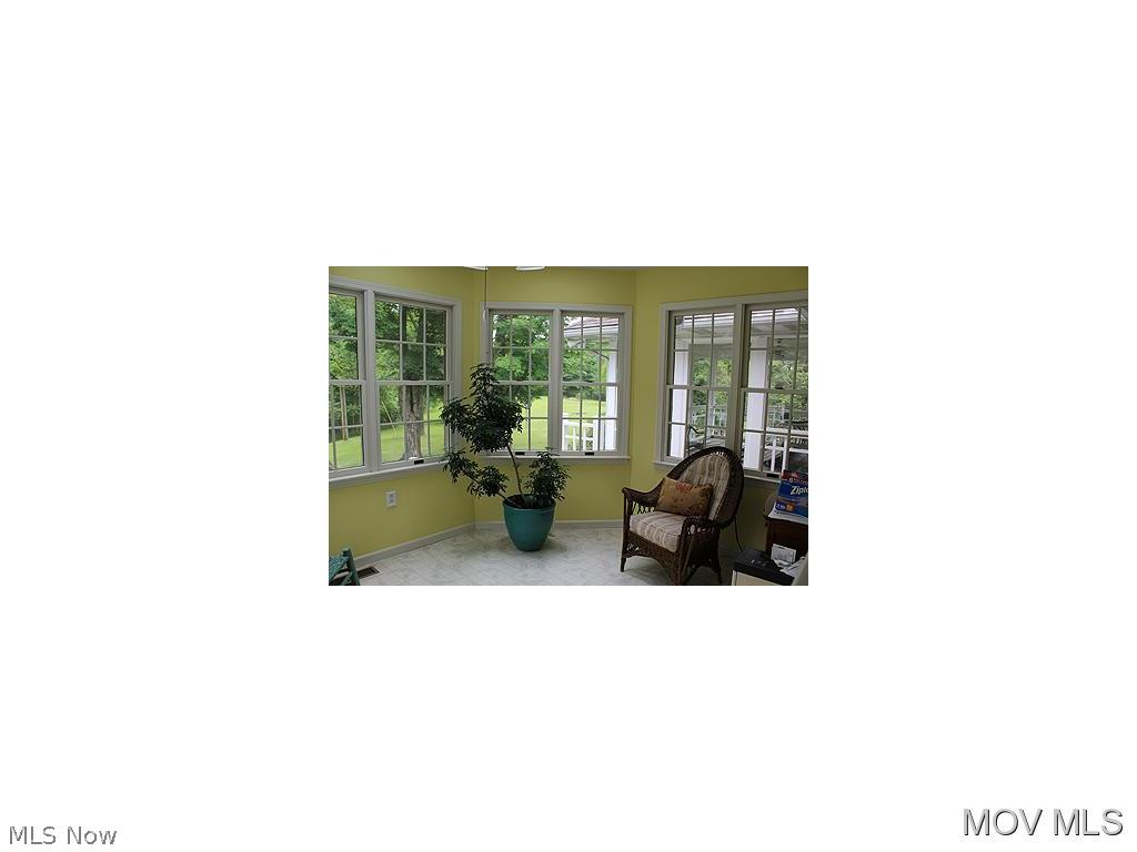 701 Nutters Fork Road Cairo, WV 26337 - Photo 10 of 24 Breakfast /sunroom