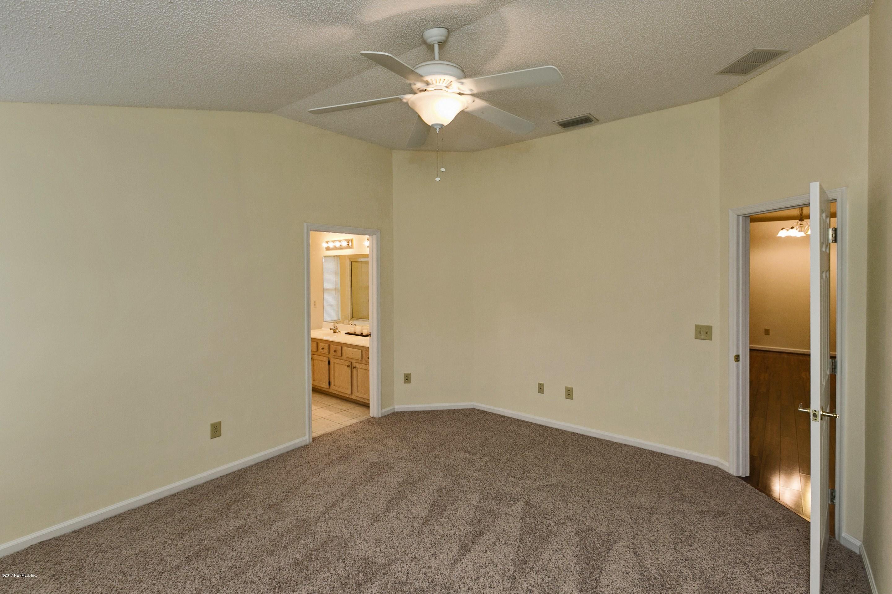 11858 Swooping Willow Road Jacksonville, FL 32223 - Photo 16 of 23 012_Master Bedroom (4)