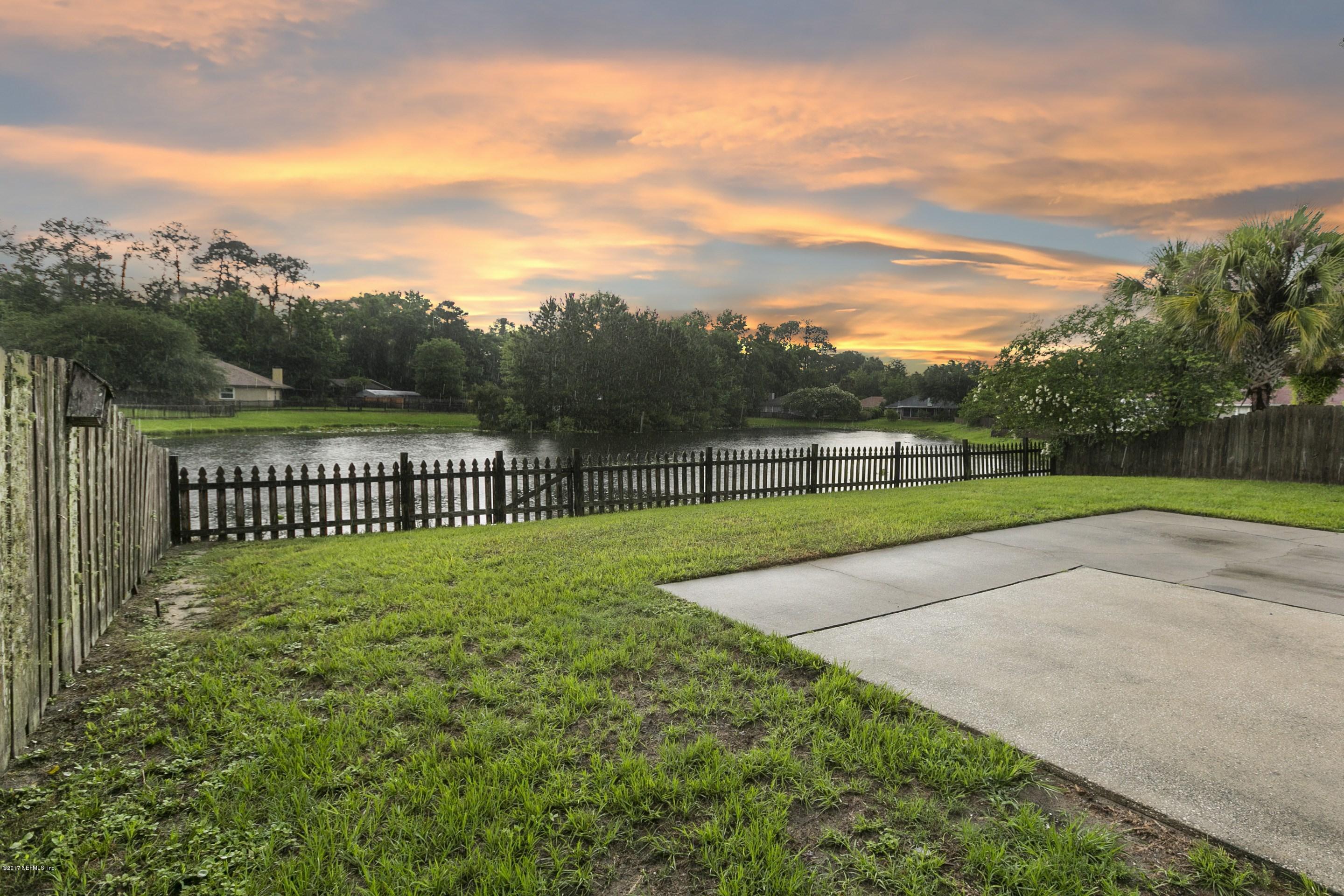 11858 Swooping Willow Road Jacksonville, FL 32223 - Photo 3 of 23 024_Lake View at Sunset