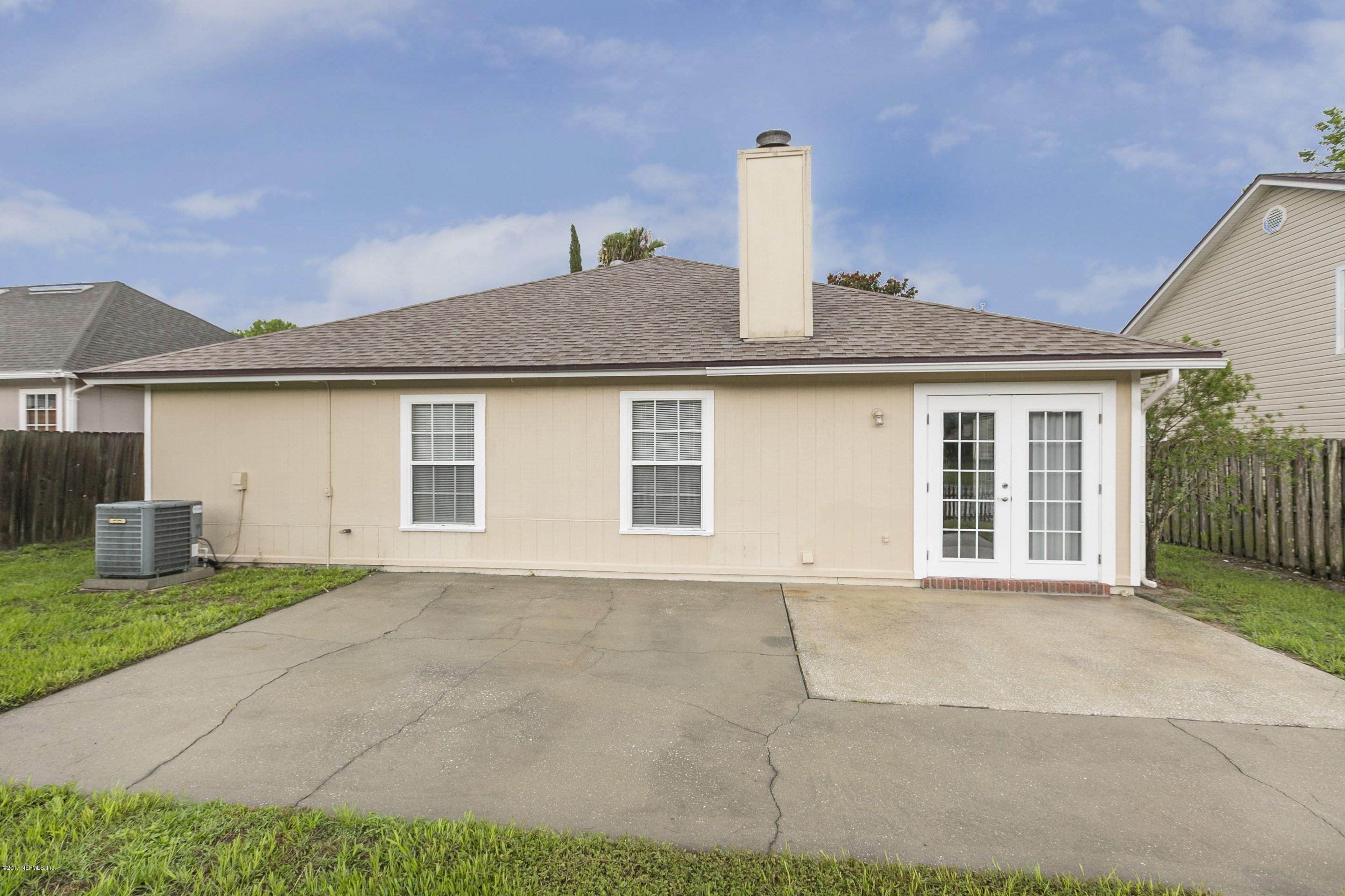 11858 Swooping Willow Road Jacksonville, FL 32223 - Photo 4 of 23 021_Exterior Back