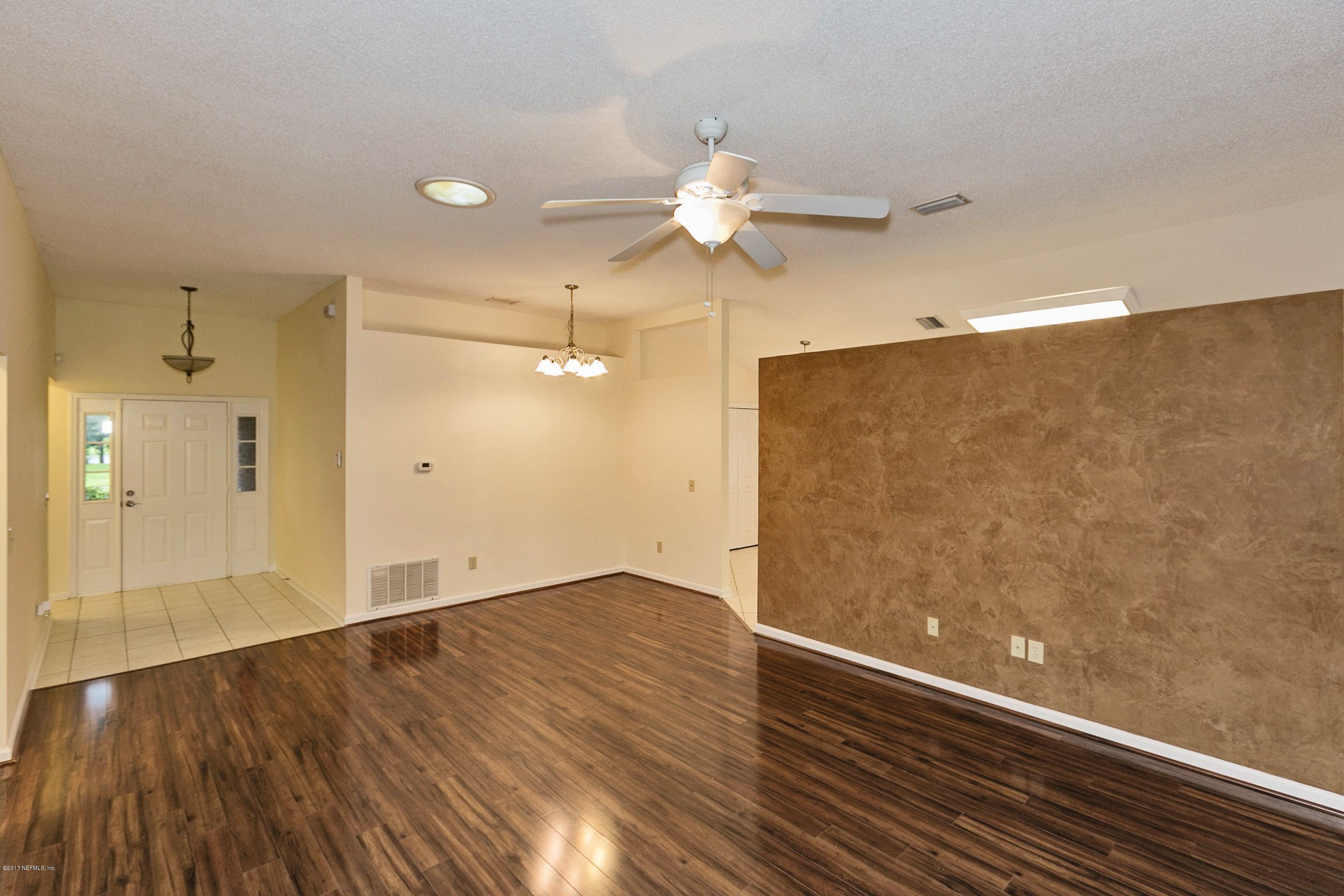 11858 Swooping Willow Road Jacksonville, FL 32223 - Photo 7 of 23 003_Living & Dining Room