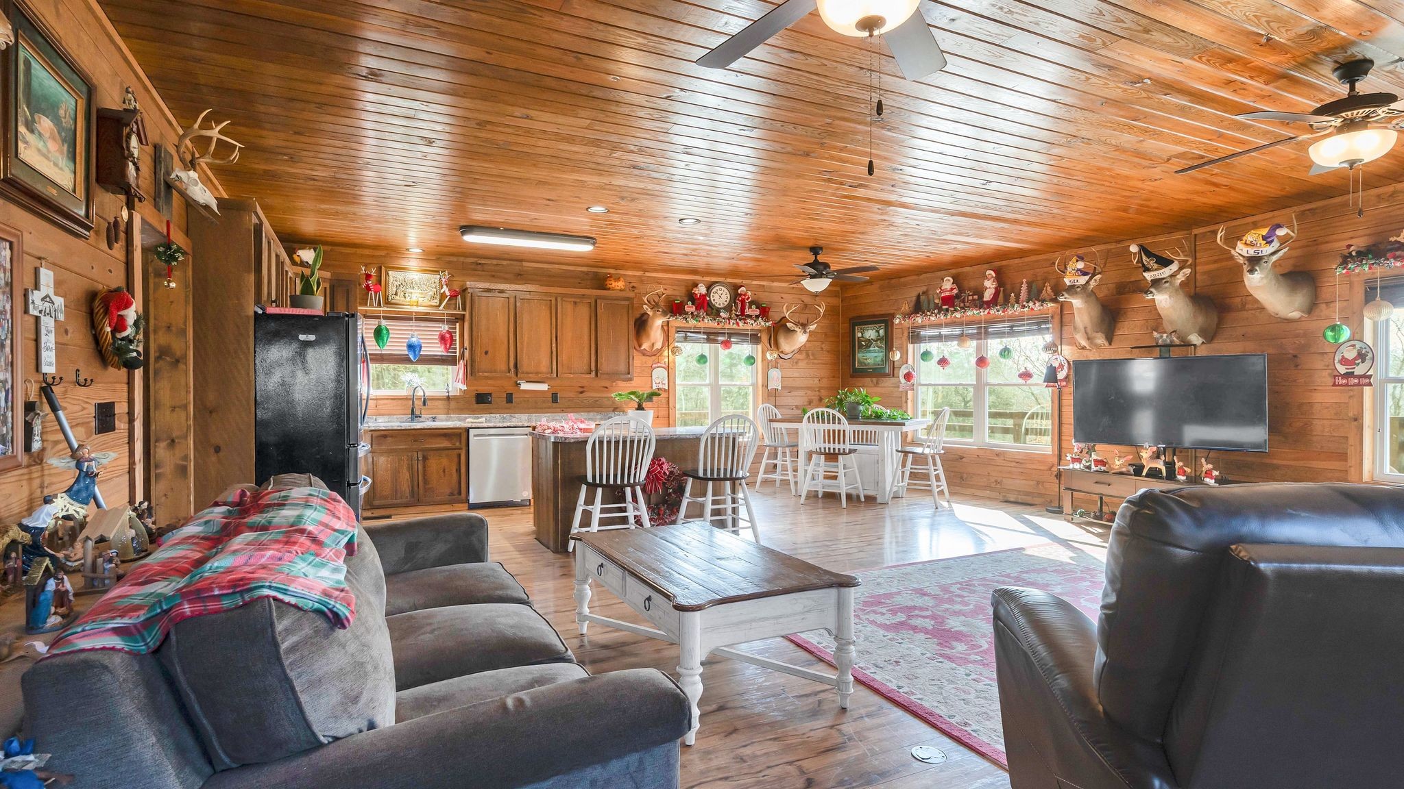 225 Kelso-Smithland Road Kelso, TN 37348 - Photo 11 of 51 a living room with furniture and a flat screen tv