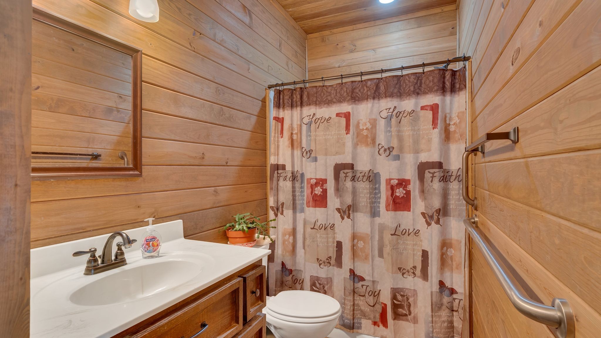 225 Kelso-Smithland Road Kelso, TN 37348 - Photo 19 of 51 a bathroom with a sink toilet and shower