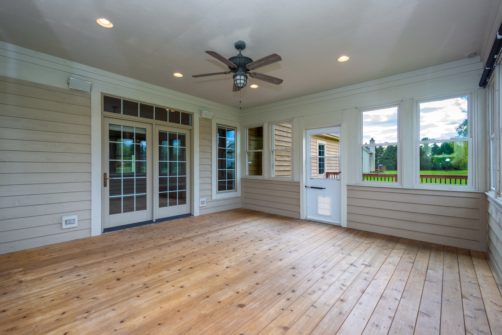 10303 Fox Bluff Lane Spring Grove, IL 60081 - Photo 35 of 44 a view of an empty room with wooden floor and a window