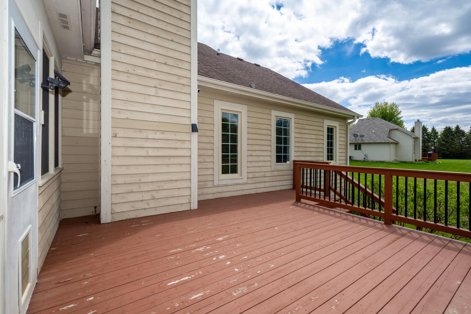 10303 Fox Bluff Lane Spring Grove, IL 60081 - Photo 36 of 44 a view of a house with a deck