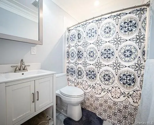 a bathroom with a sink and toilet