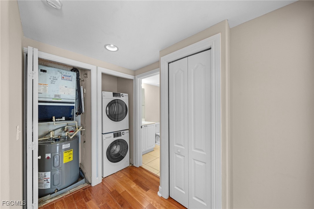 4160 Castilla Circle, Unit 106 Fort Myers, FL 33916 - Photo 15 of 37 a utility room with dryer and washer