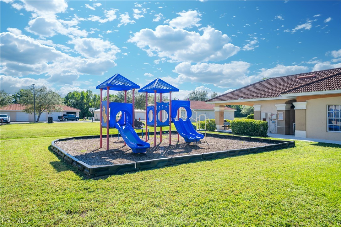 4160 Castilla Circle, Unit 106 Fort Myers, FL 33916 - Photo 31 of 37 a view of pool with lawn chairs and couches