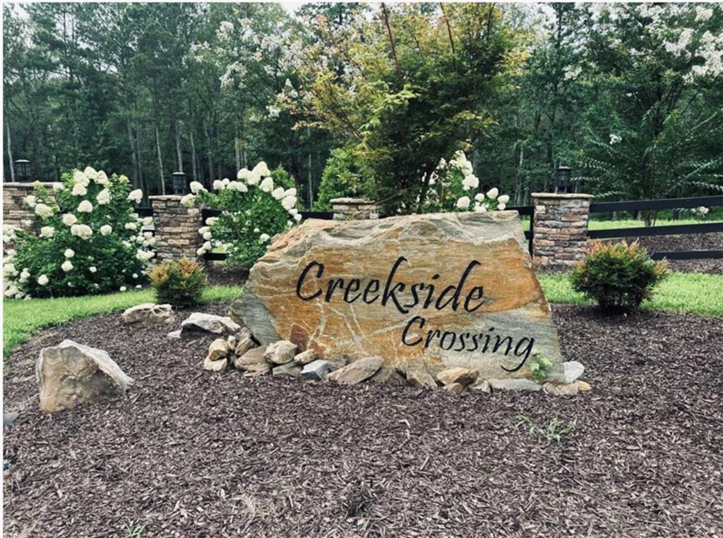 314 Pebble Trace Talking Rock, GA 30175 - Photo 9 of 10 a sign on the side of the road