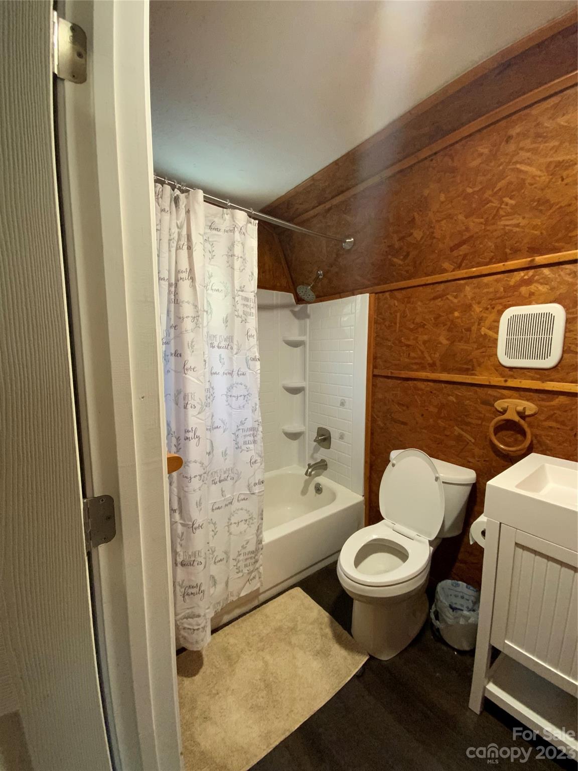 281 Spring Water Drive Brevard, NC 28712 - Photo 12 of 14 a bathroom with a toilet and a shower
