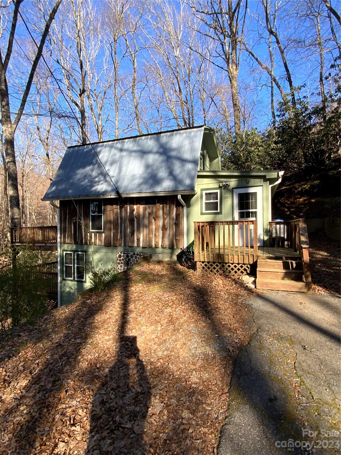 281 Spring Water Drive Brevard, NC 28712 - Photo 2 of 14 a view of a house with a patio