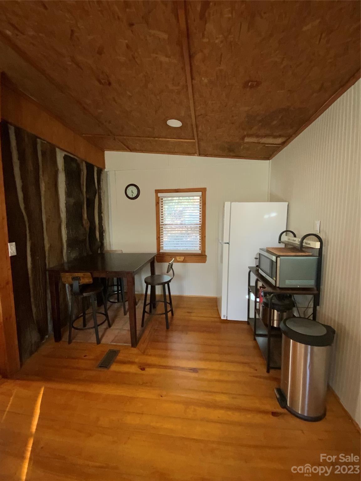 281 Spring Water Drive Brevard, NC 28712 - Photo 3 of 14 a view of a dining room with furniture