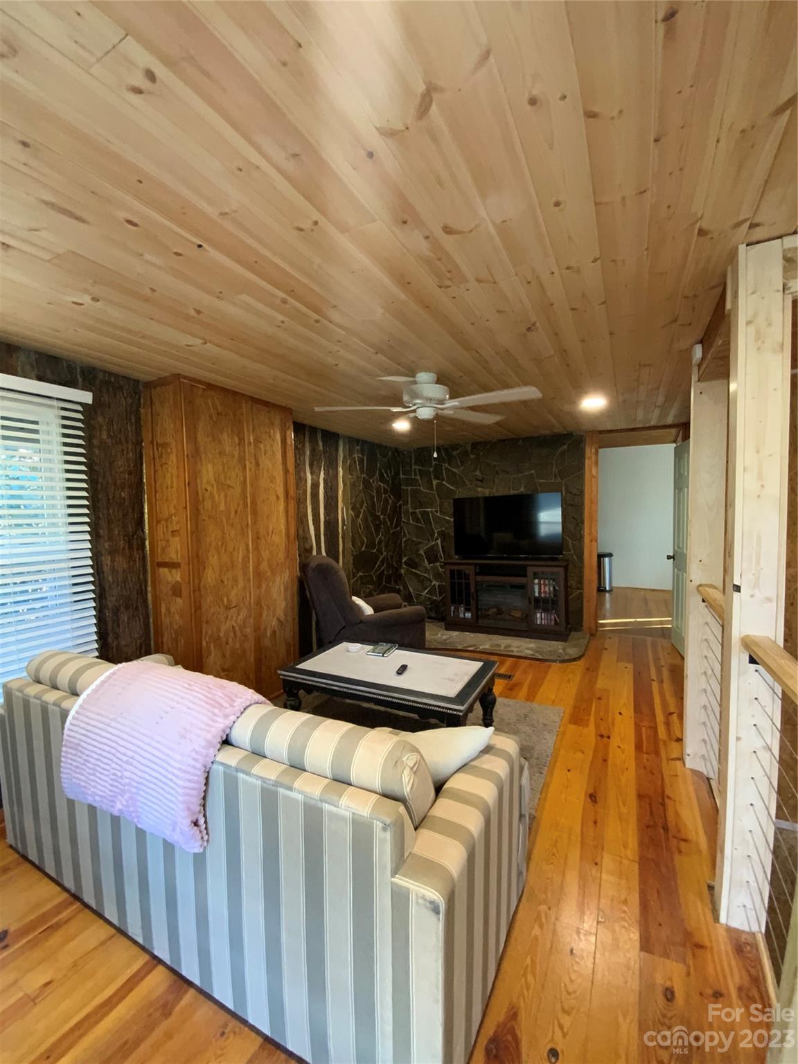 281 Spring Water Drive Brevard, NC 28712 - Photo 5 of 14 a bed room with a bed and a television