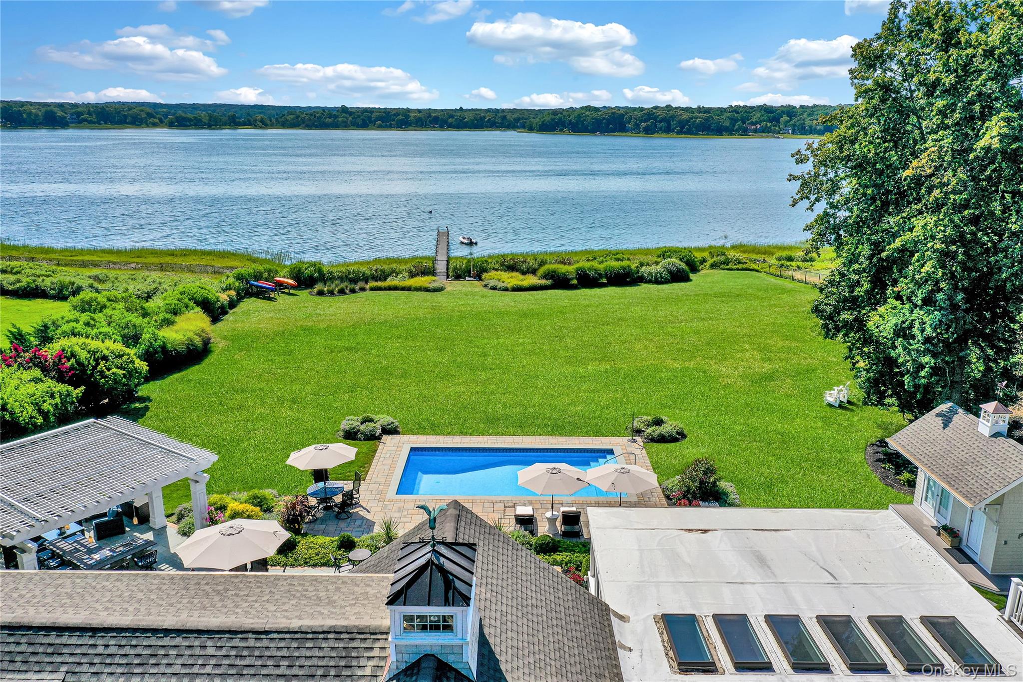 111 Old Field Road Setauket, NY 11733 - Photo 2 of 47 a view of a swimming pool and lounge chair