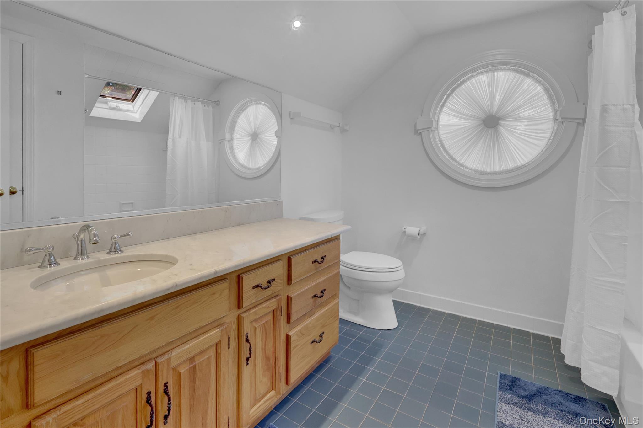 111 Old Field Road Setauket, NY 11733 - Photo 24 of 47 a spacious bathroom with 2 sink and a mirror