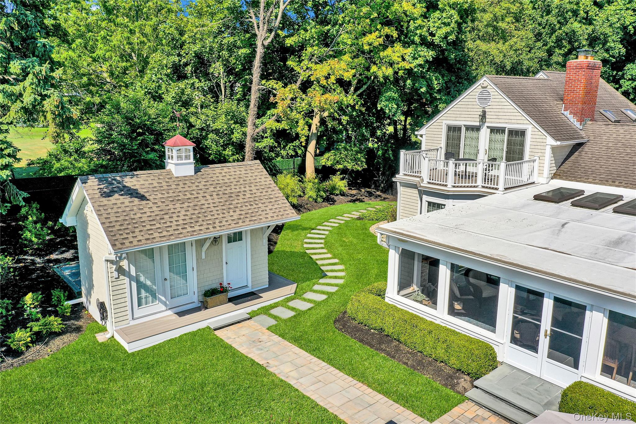 111 Old Field Road Setauket, NY 11733 - Photo 30 of 47 a aerial view of a house with a yard