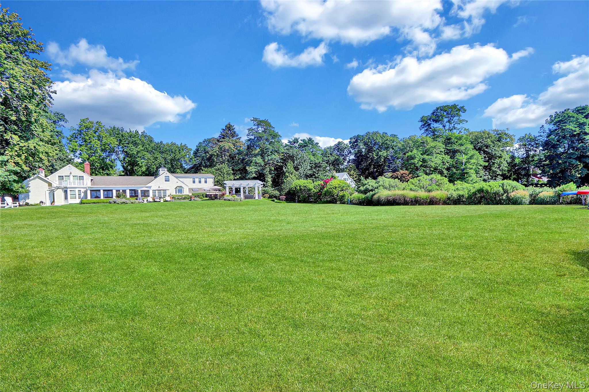 111 Old Field Road Setauket, NY 11733 - Photo 33 of 47 a view of a house with a big yard