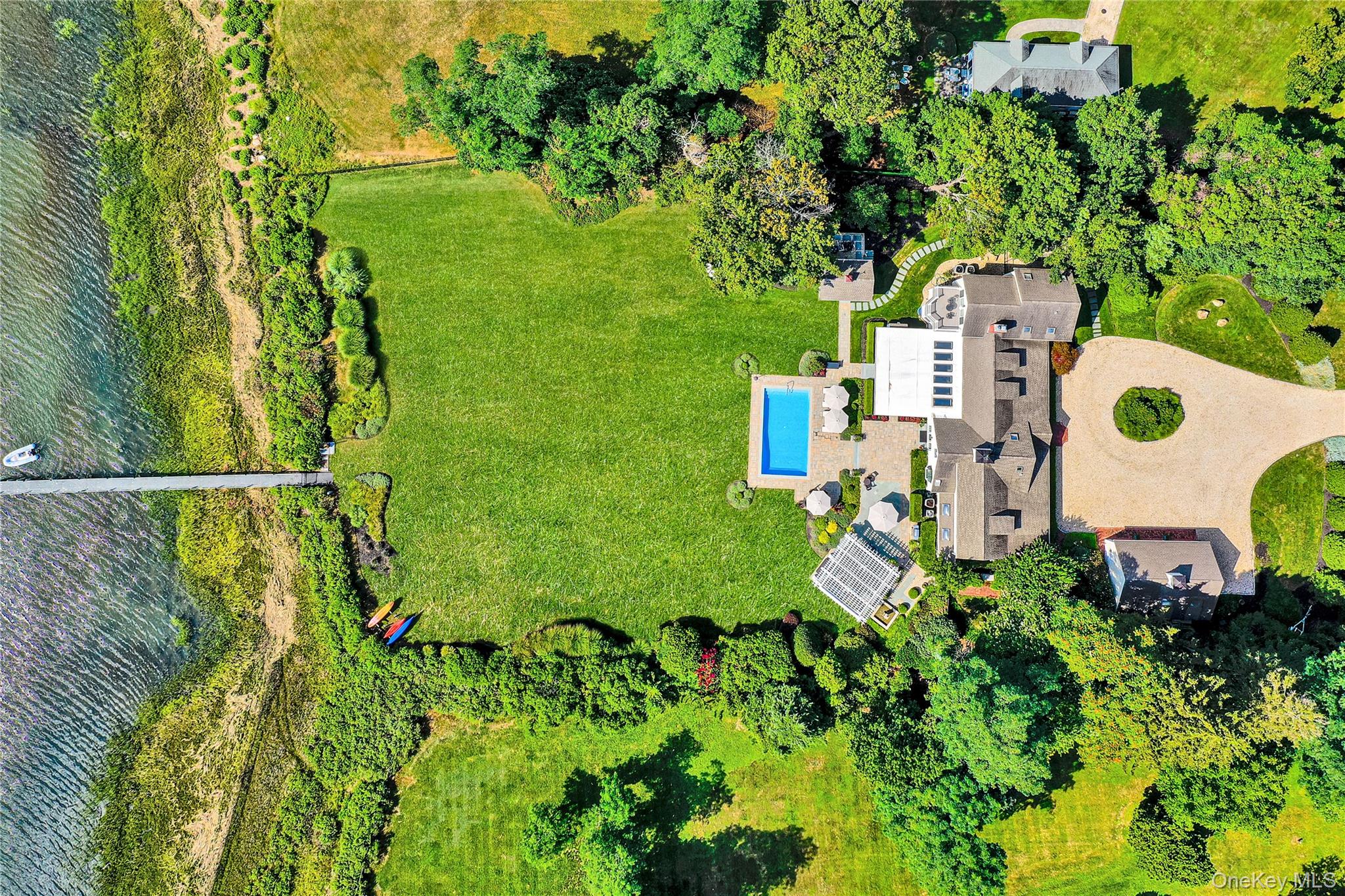 111 Old Field Road Setauket, NY 11733 - Photo 39 of 47 an aerial view of residential house with outdoor space and trees all around
