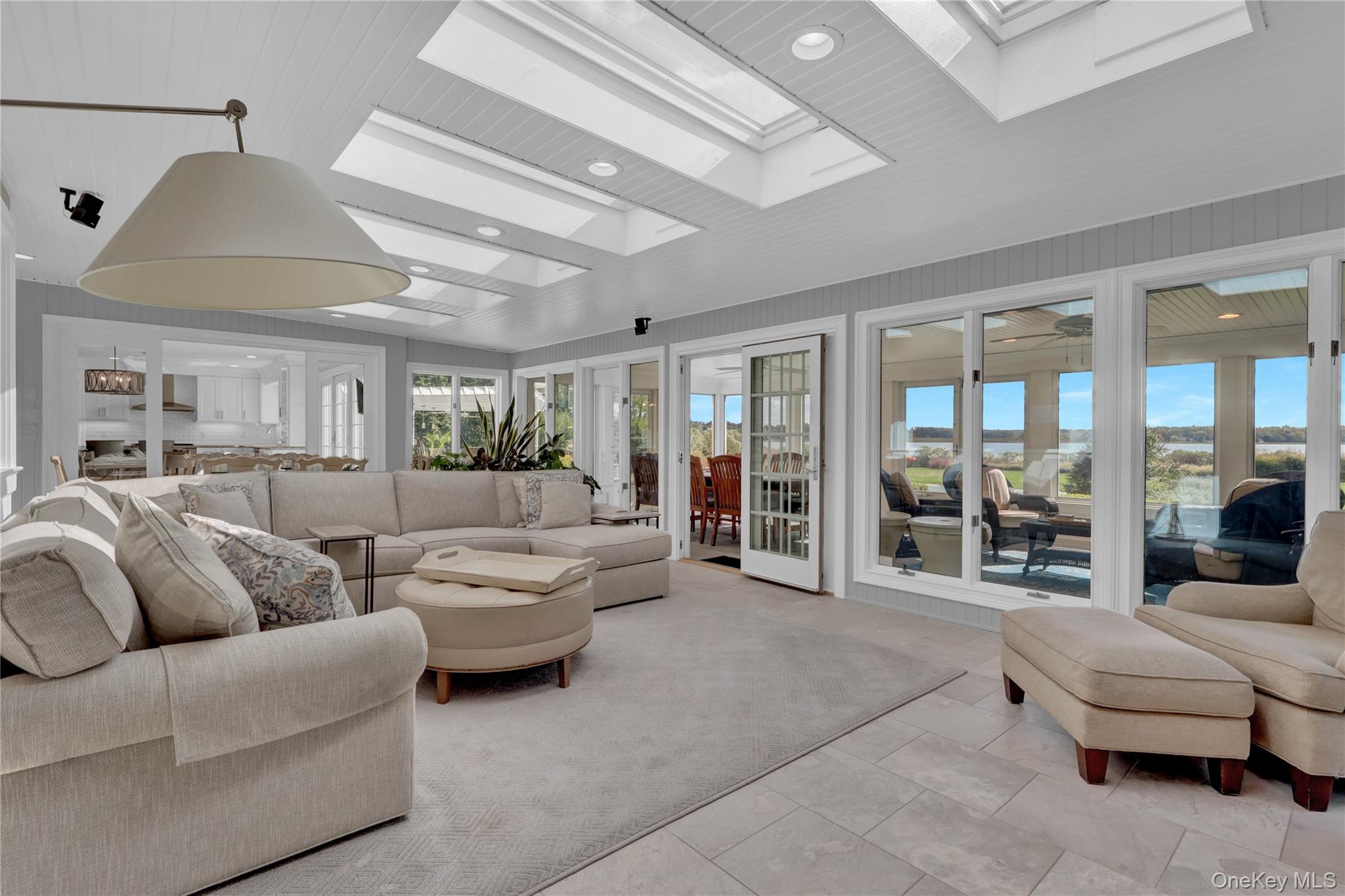 111 Old Field Road Setauket, NY 11733 - Photo 8 of 47 a living room with furniture and a large window