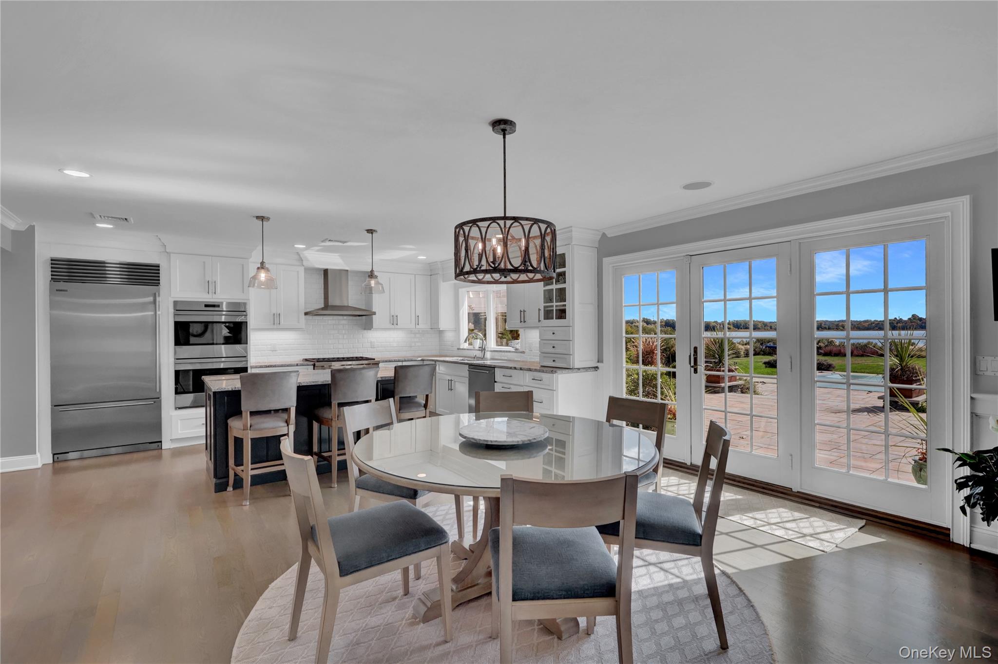 111 Old Field Road Setauket, NY 11733 - Photo 10 of 47 a dining room with furniture window and wooden floor