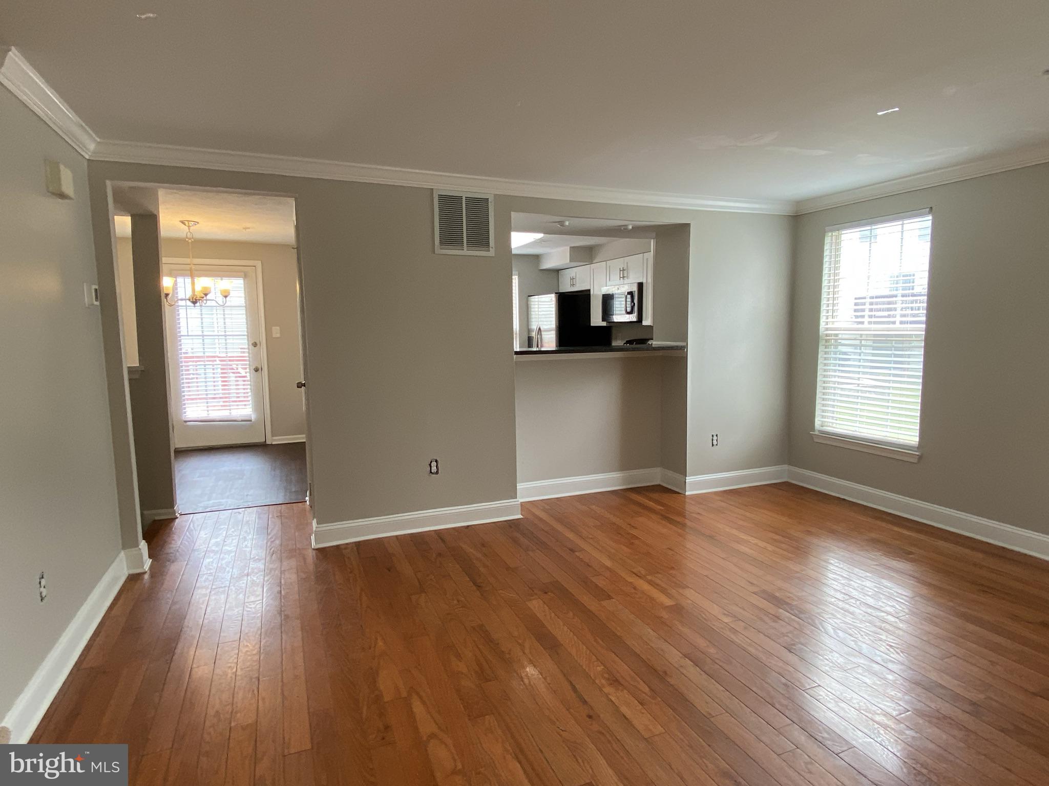 9419 Joleon Road Randallstown, MD 21133 - Photo 4 of 18 Living Room looking toward Kitchen and Dining Area
