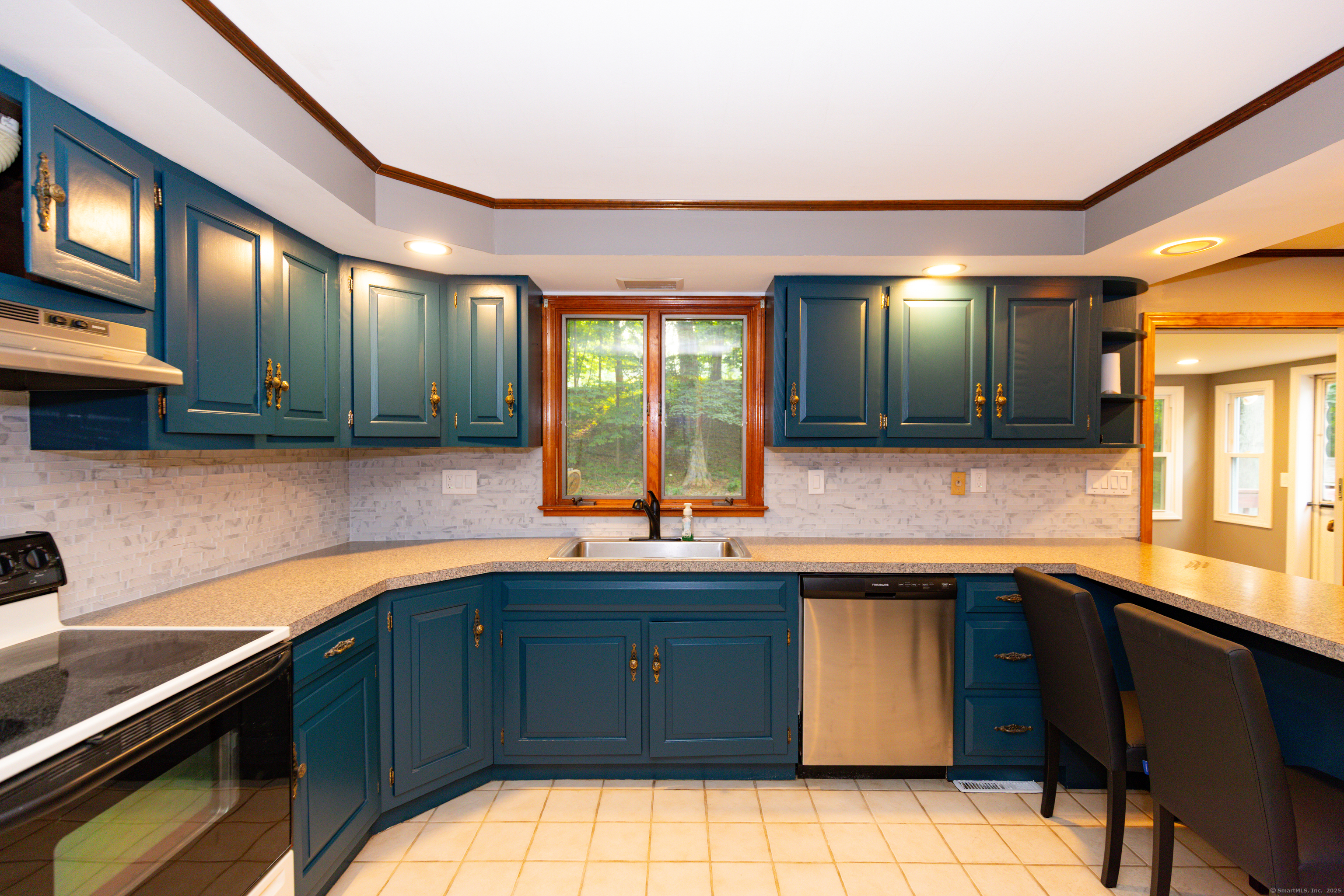 45 Renshaw Road Hamden, CT 06518 - Photo 12 of 26 a kitchen with a sink and cabinets