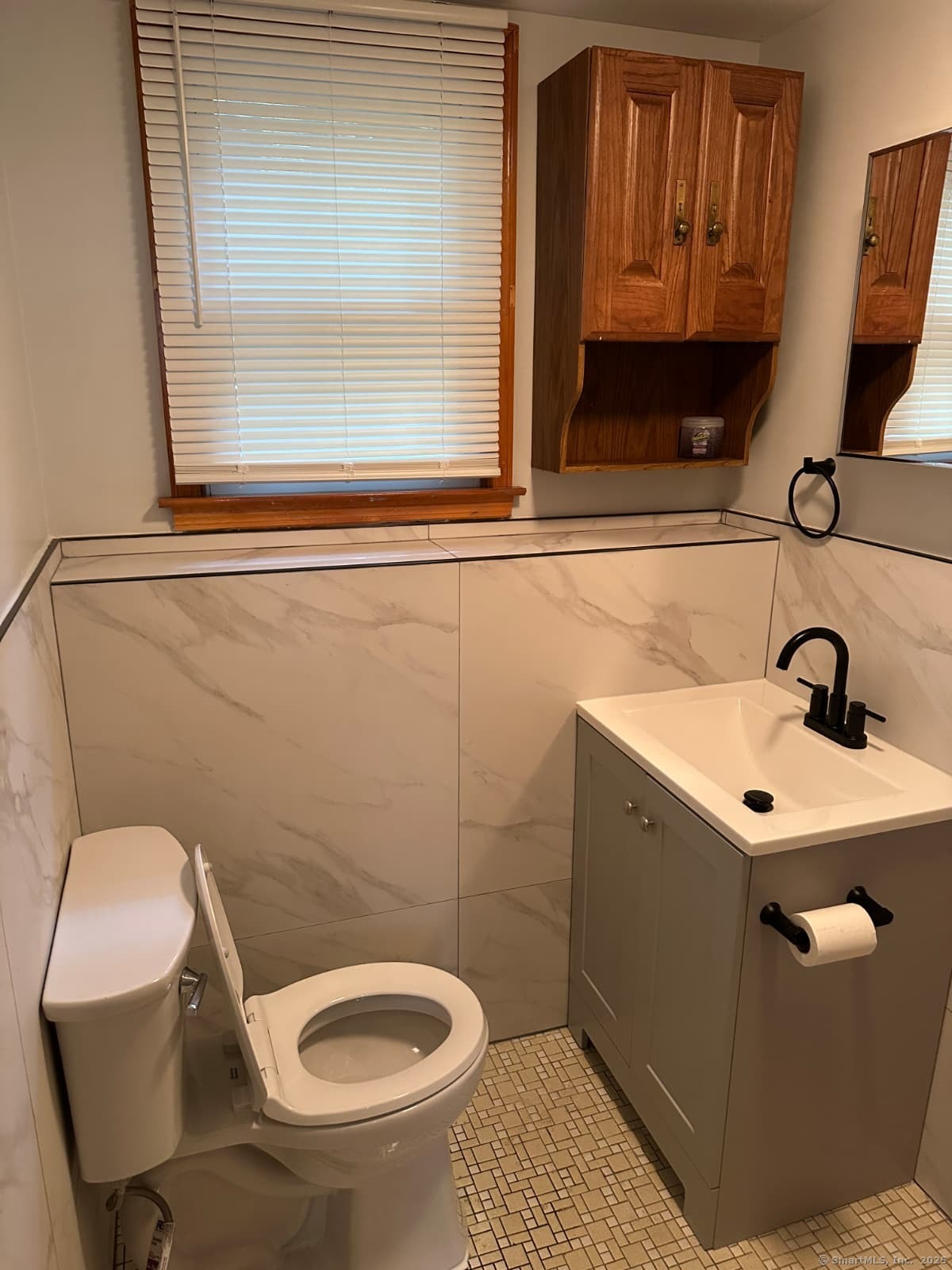 45 Renshaw Road Hamden, CT 06518 - Photo 26 of 26 a bathroom with a toilet sink and mirror