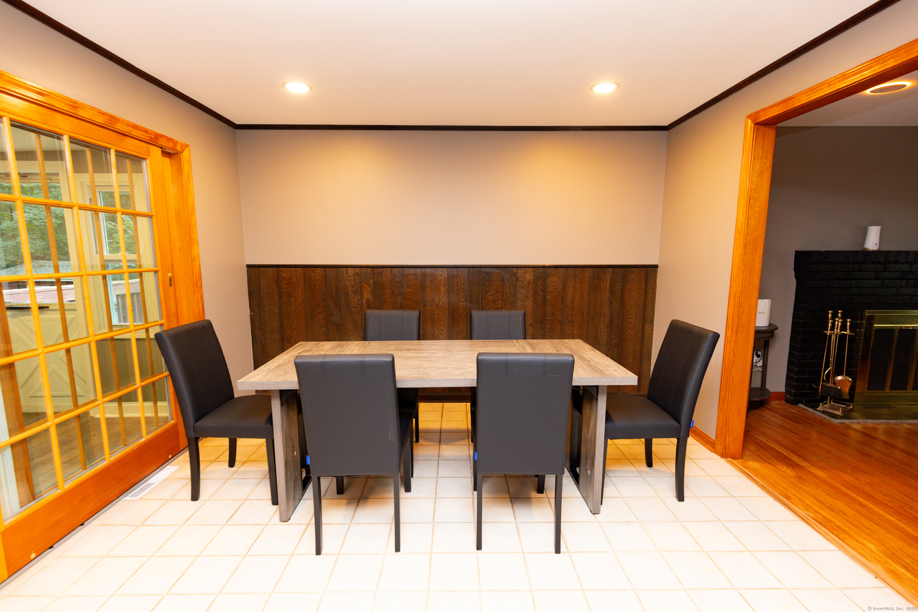 45 Renshaw Road Hamden, CT 06518 - Photo 10 of 26 a view of a dining room with furniture and wooden floor
