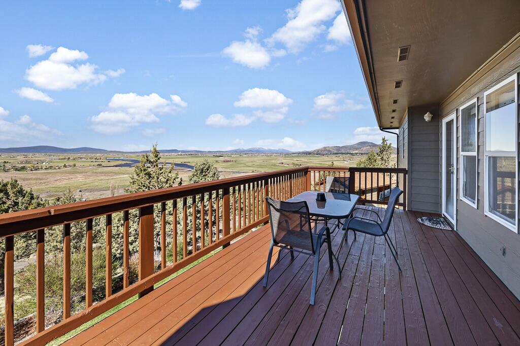 13351 Crystal Springs Road Klamath Falls, OR 97603 - Photo 27 of 51 a view of a balcony with wooden floor