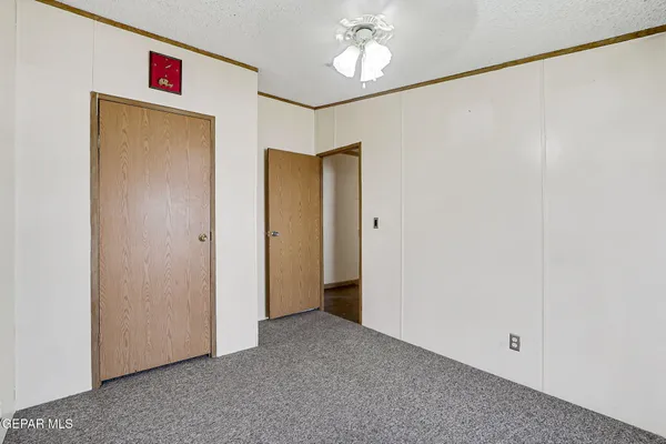 a kitchen with a sink stove and refrigerator