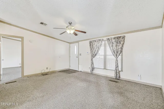 a view of a room with a large window