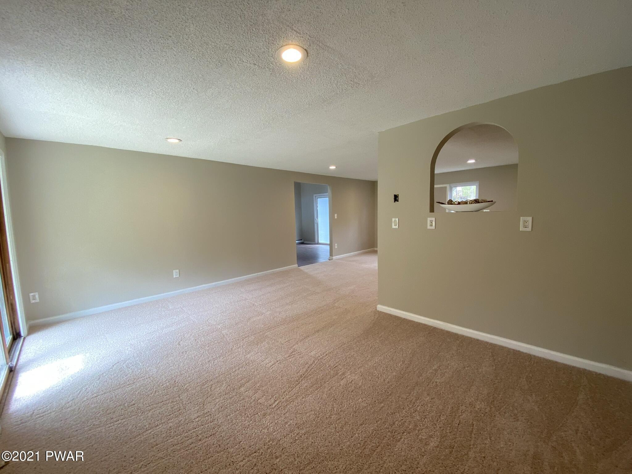 154 Heather Hill Road Dingmans Ferry, PA 18328 - Photo 16 of 58 16 Lower Level Living Room Area 1 view 3