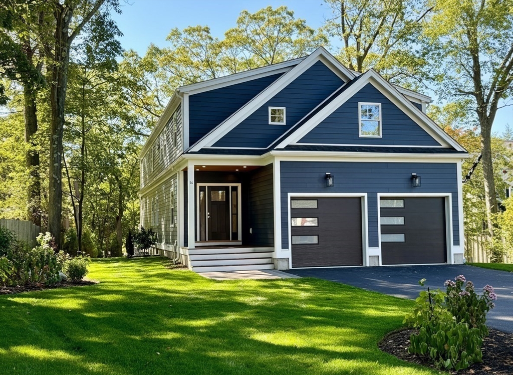 14 Benjamin Road Lexington, MA 02421 - Photo 2 of 35 a front view of a house with a yard