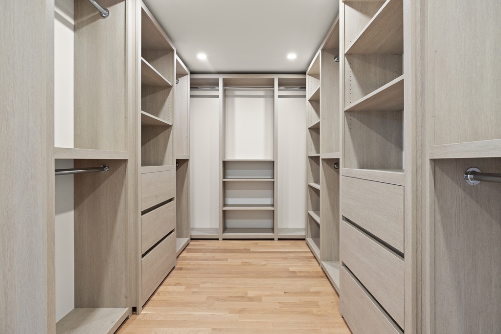 14 Benjamin Road Lexington, MA 02421 - Photo 33 of 35 a view of walk in closet with empty racks