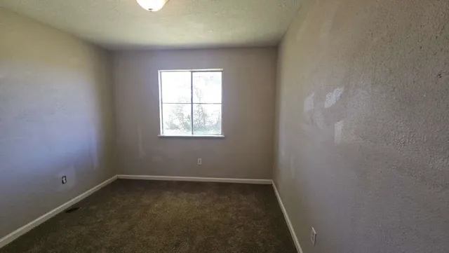 an empty room with a window